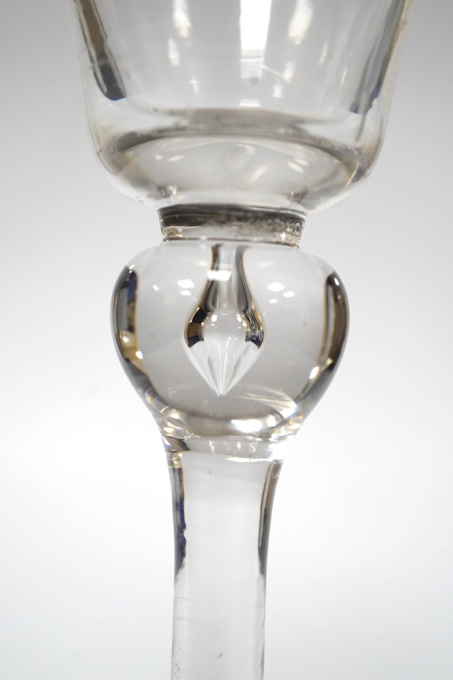 A balustroid wine glass, c.1740, with round funnel bowl, teared knop stem, folded foot, 17cm high. Condition - good